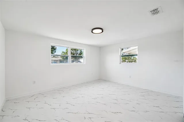 an empty room with a window