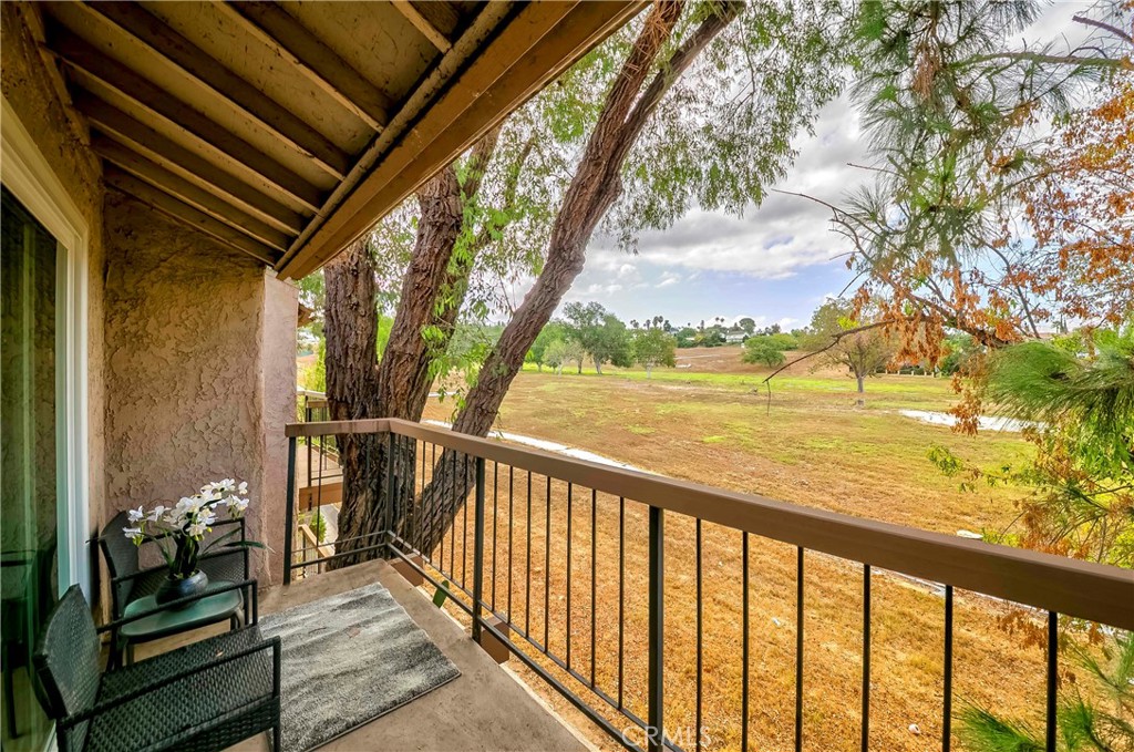 1525 Walnut Leaf Drive, Unit 211 Walnut, CA 91789 - Photo 20 of 26 a view of balcony with furniture