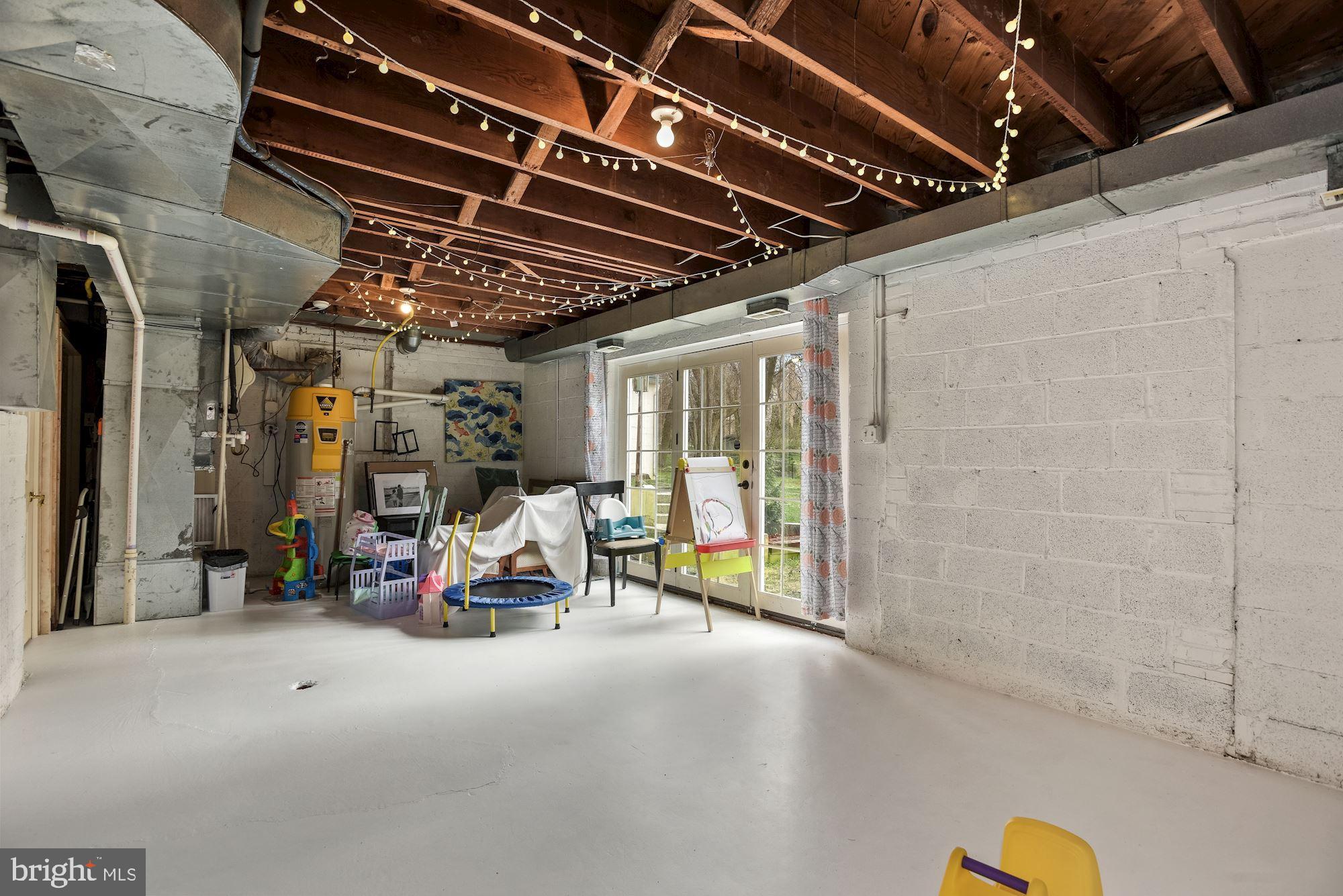 6313 Old Chesterbrook Road McLean, VA 22101 - Photo 46 of 51 Lower Level Walk-out Unfinished space