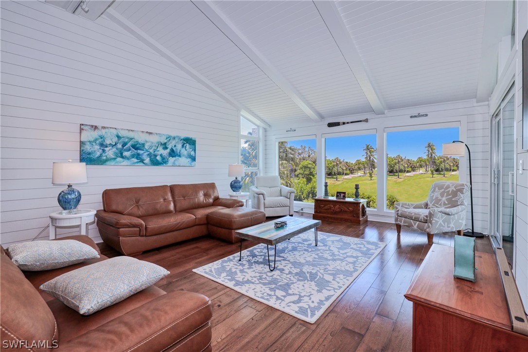 1021 Sand Castle Road Sanibel, FL 33957 - Photo 13 of 49 a living room with furniture and a large window