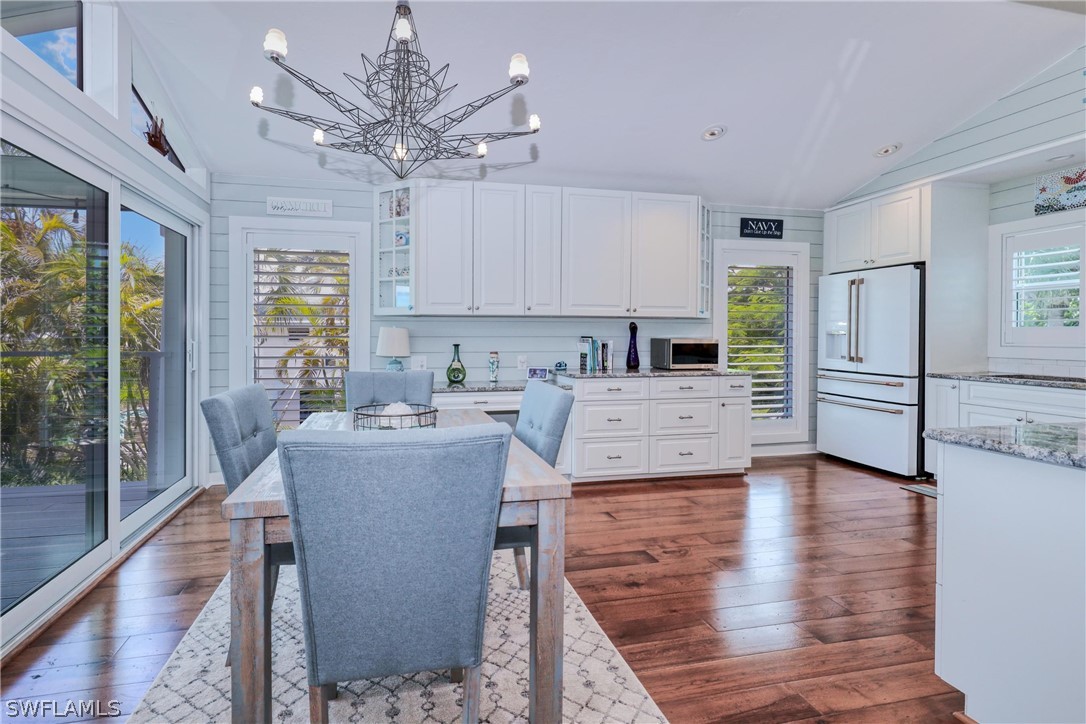 1021 Sand Castle Road Sanibel, FL 33957 - Photo 19 of 49 a view of kitchen with sink and refrigerator