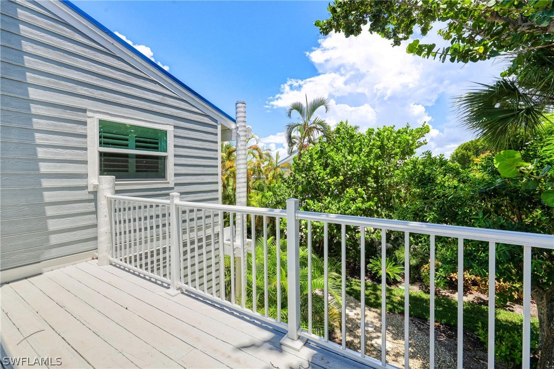 1021 Sand Castle Road Sanibel, FL 33957 - Photo 28 of 49 a view of a wooden fence