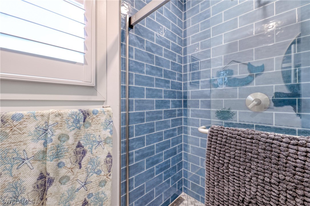 1021 Sand Castle Road Sanibel, FL 33957 - Photo 39 of 49 a bathroom with a shower