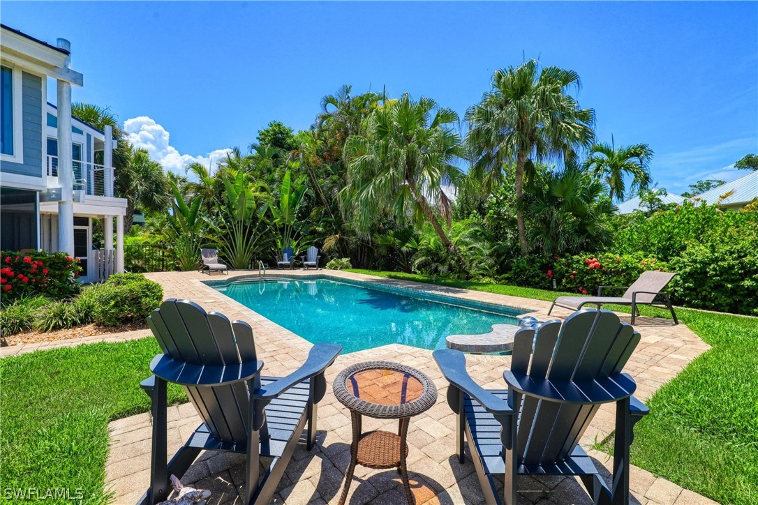 1021 Sand Castle Road Sanibel, FL 33957 - Photo 44 of 49 a view of an outdoor sitting space