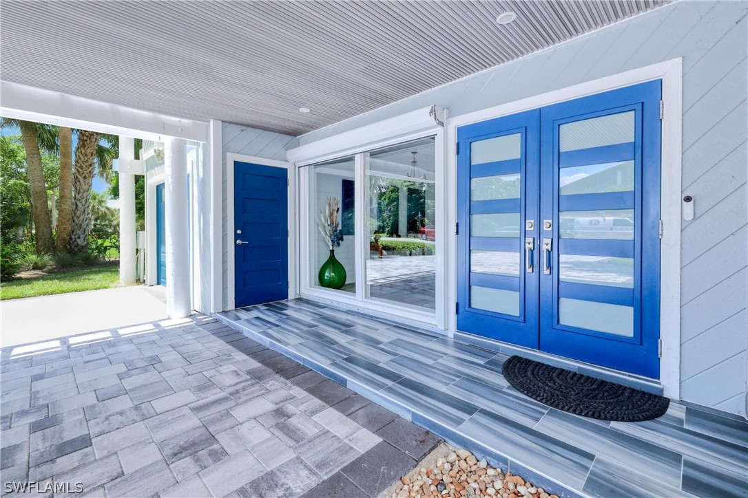 1021 Sand Castle Road Sanibel, FL 33957 - Photo 5 of 49 a view of front door of a house