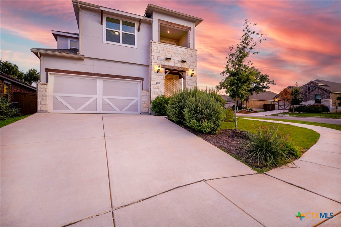 a house view with a outdoor space