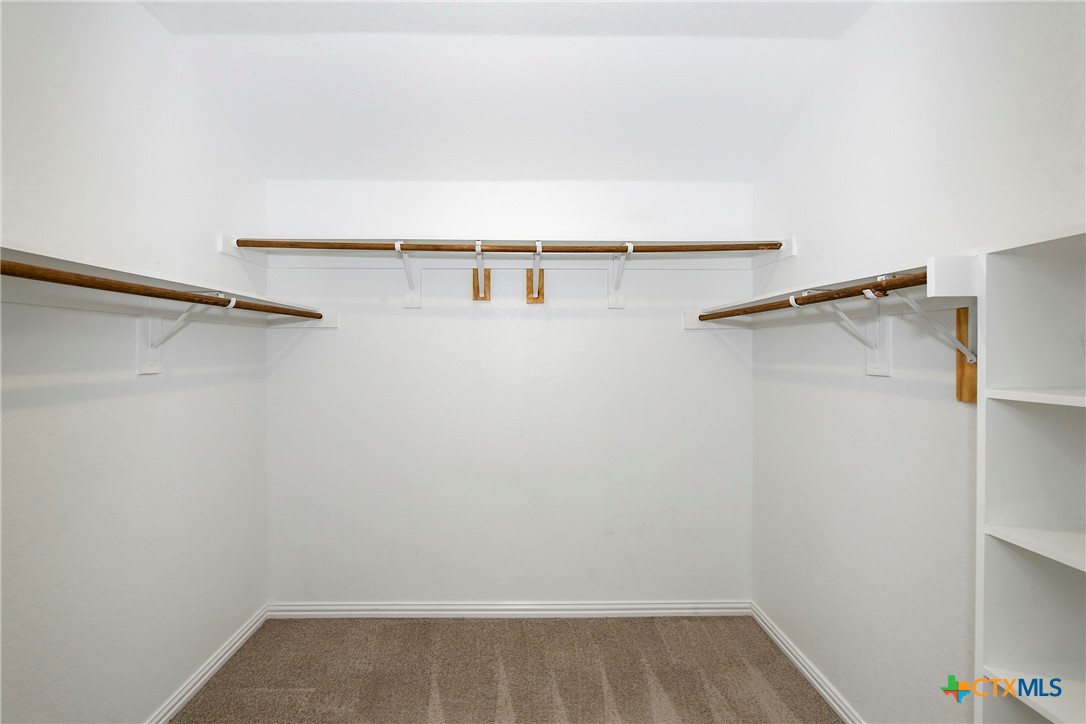 2069 Flametree Avenue New Braunfels, TX 78132 - Photo 23 of 46 a view of small space with racks on the wall