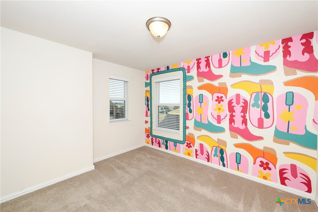 2069 Flametree Avenue New Braunfels, TX 78132 - Photo 30 of 46 a view of play room with furniture and toys