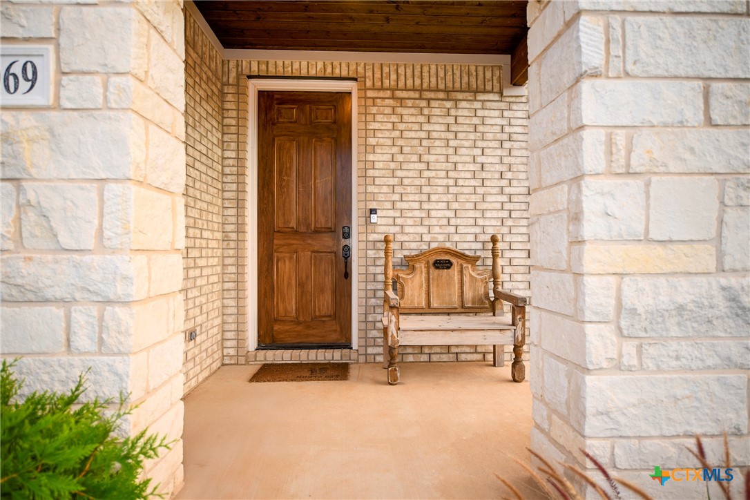 2069 Flametree Avenue New Braunfels, TX 78132 - Photo 3 of 46 a view of front door of house