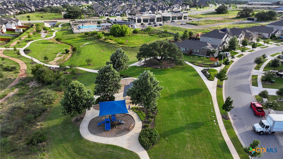 2069 Flametree Avenue New Braunfels, TX 78132 - Photo 42 of 46 an aerial view of residential houses with outdoor space and lake view