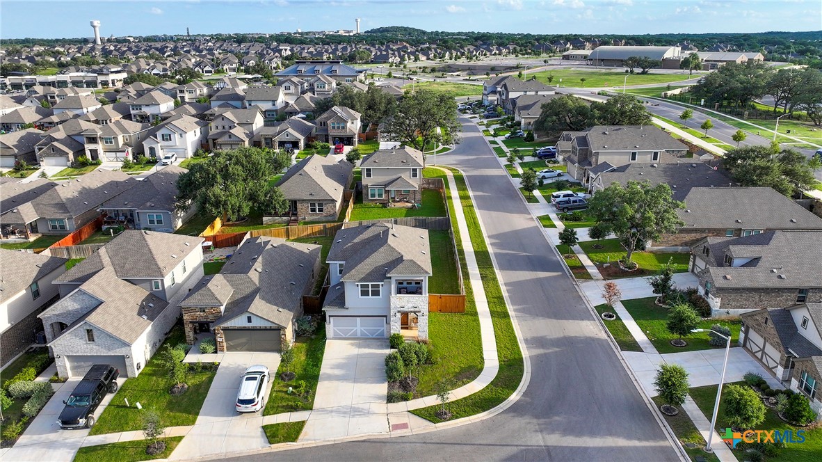 2069 Flametree Avenue New Braunfels, TX 78132 - Photo 45 of 46 an aerial view of multiple houses with yard