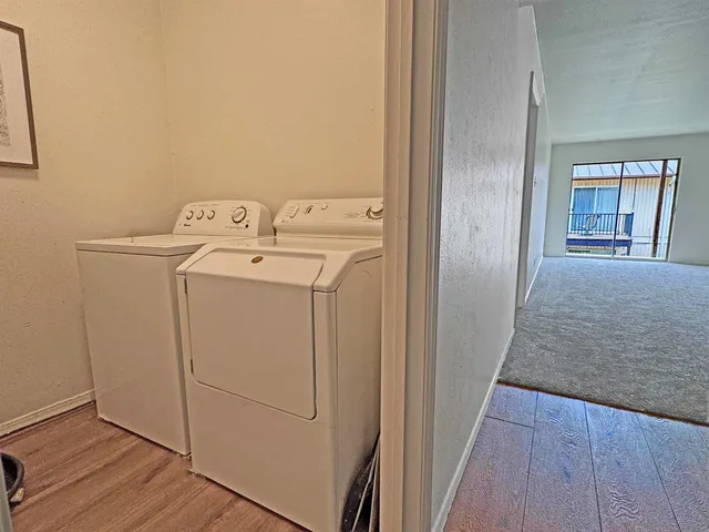 a utility room with dryer and washer