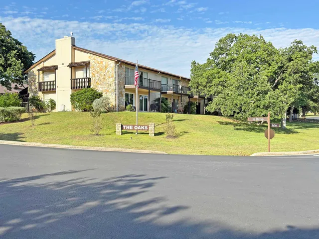 a view of a house with a swimming pool