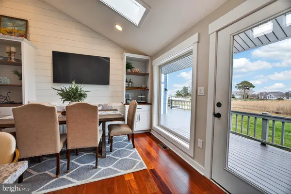 a spacious bedroom with a large bed and a window