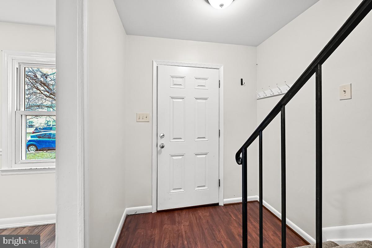 124 Marlow Street Southwest Leesburg, VA 20175 - Photo 11 of 37 a view of an entryway with wooden floor