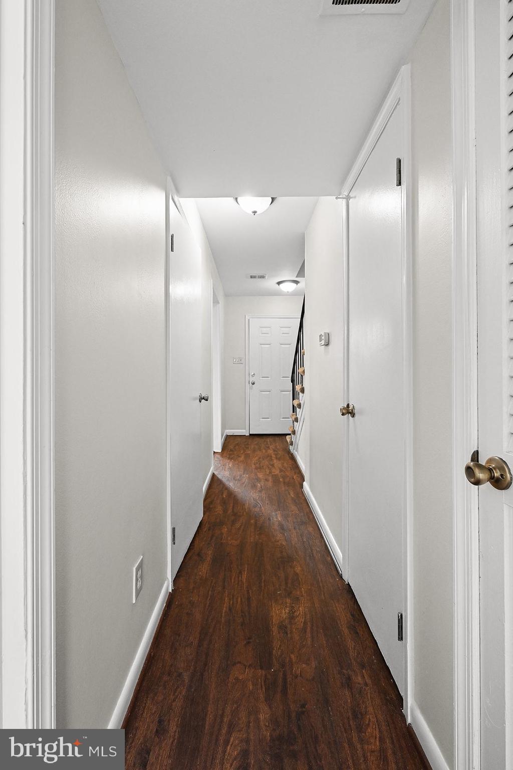 124 Marlow Street Southwest Leesburg, VA 20175 - Photo 20 of 37 a view of a hallway with wooden floor