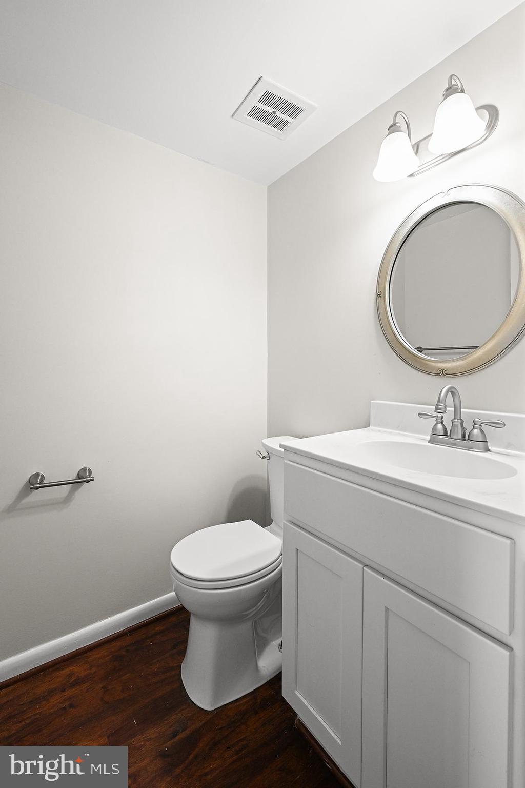 124 Marlow Street Southwest Leesburg, VA 20175 - Photo 22 of 37 a bathroom with a sink and a toilet