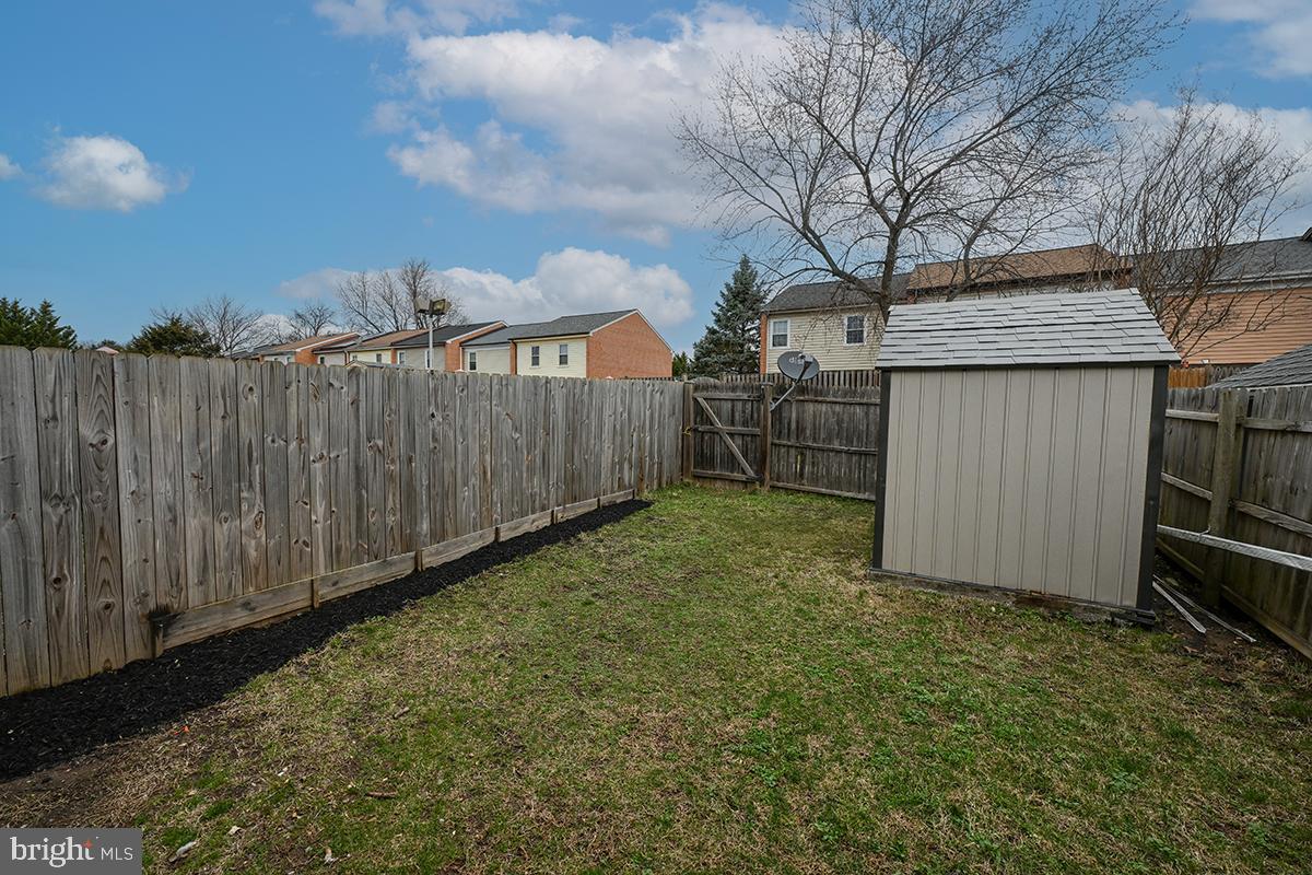124 Marlow Street Southwest Leesburg, VA 20175 - Photo 3 of 37 a view of a backyard