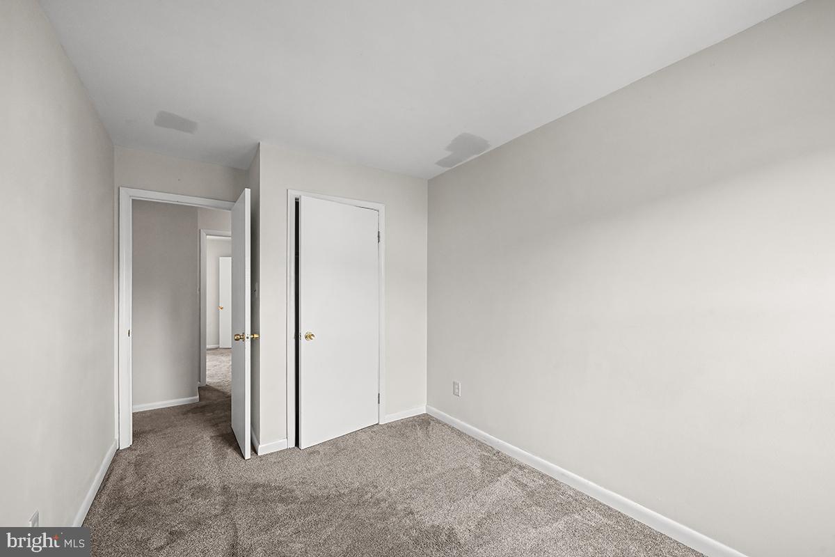124 Marlow Street Southwest Leesburg, VA 20175 - Photo 32 of 37 a view of an empty room