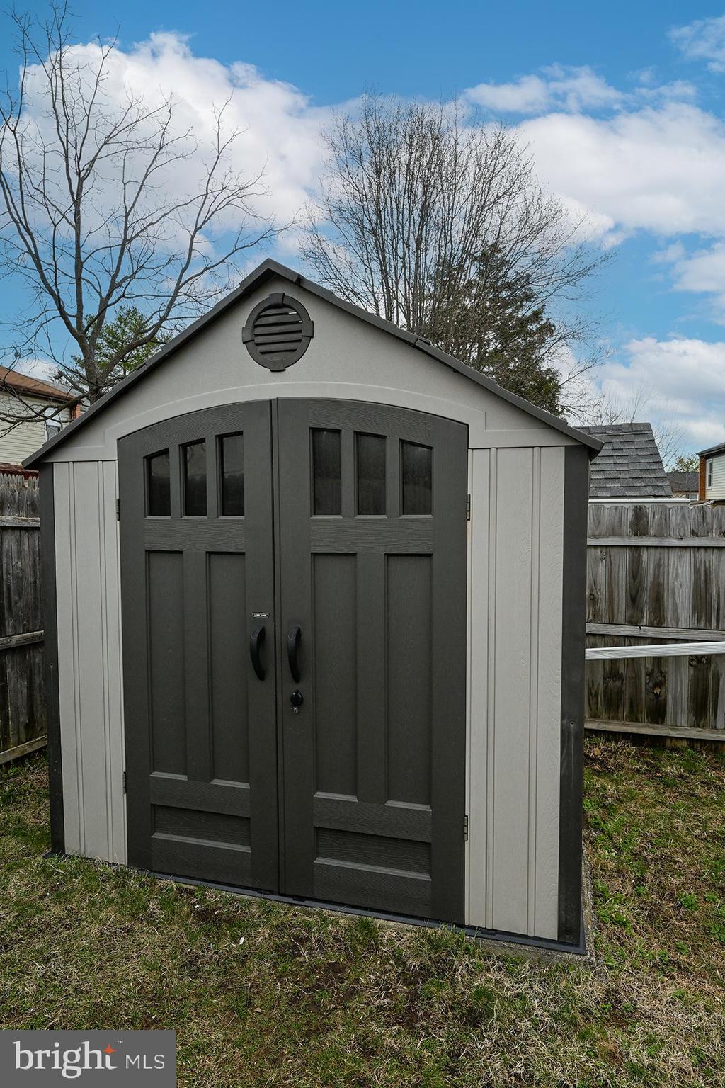 124 Marlow Street Southwest Leesburg, VA 20175 - Photo 34 of 37 a front view of a house with a yard