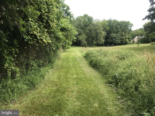 a view of outdoor space and a yard