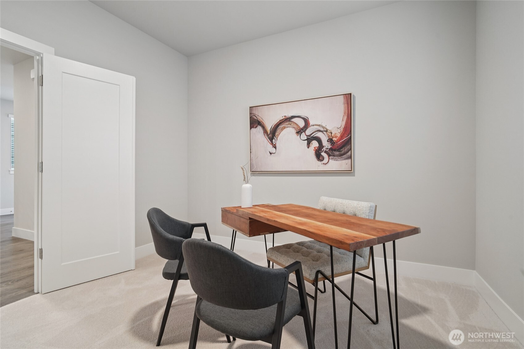 3822 194th Street Southeast Bothell, WA 98012 - Photo 11 of 29 a view of a dining room with furniture and wooden floor