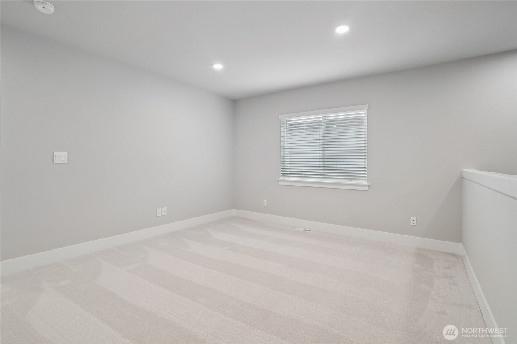 3822 194th Street Southeast Bothell, WA 98012 - Photo 18 of 29 an empty room with windows