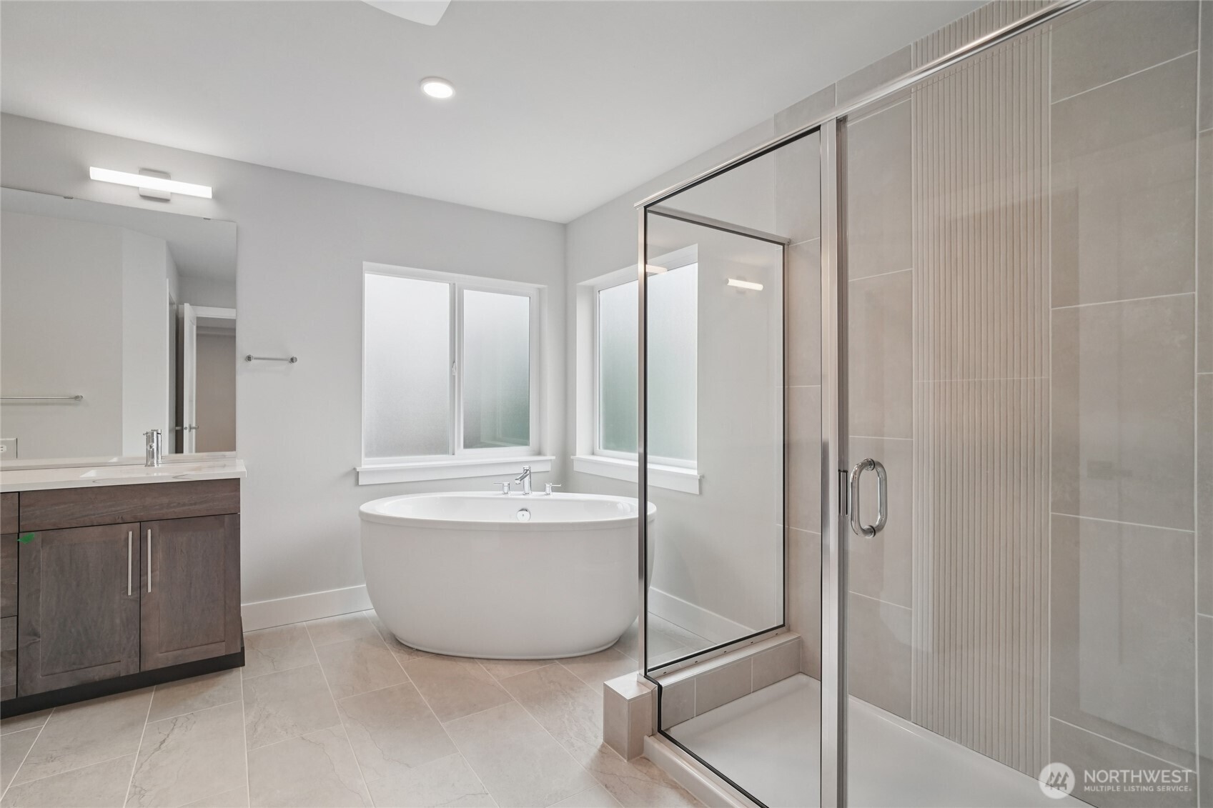3822 194th Street Southeast Bothell, WA 98012 - Photo 22 of 29 a bathroom with a bathtub and a sink
