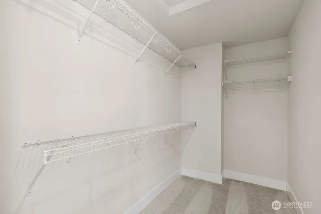 a view of an empty walk in closet