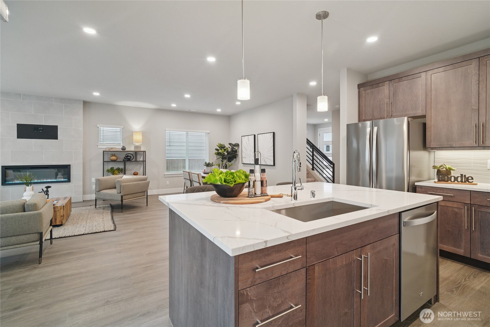 3822 194th Street Southeast Bothell, WA 98012 - Photo 5 of 29 a kitchen with a sink a counter top stainless steel appliances and cabinets