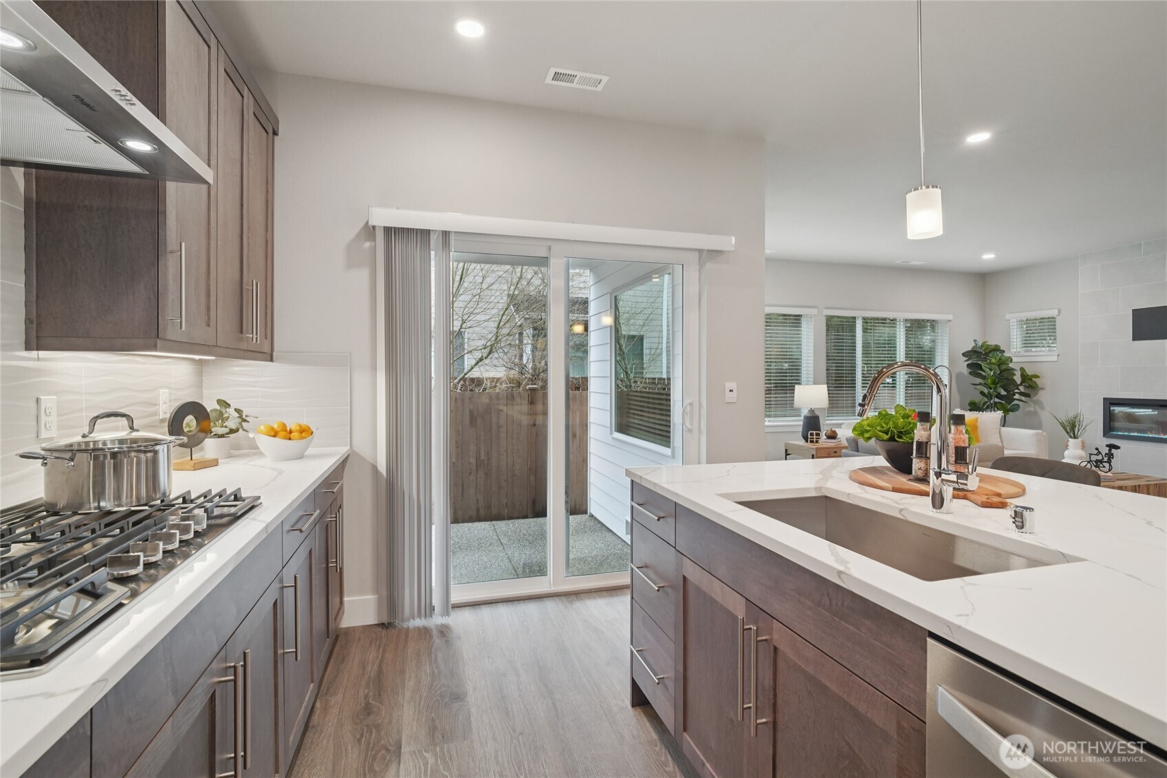 3822 194th Street Southeast Bothell, WA 98012 - Photo 6 of 29 a kitchen with sink refrigerator and stove