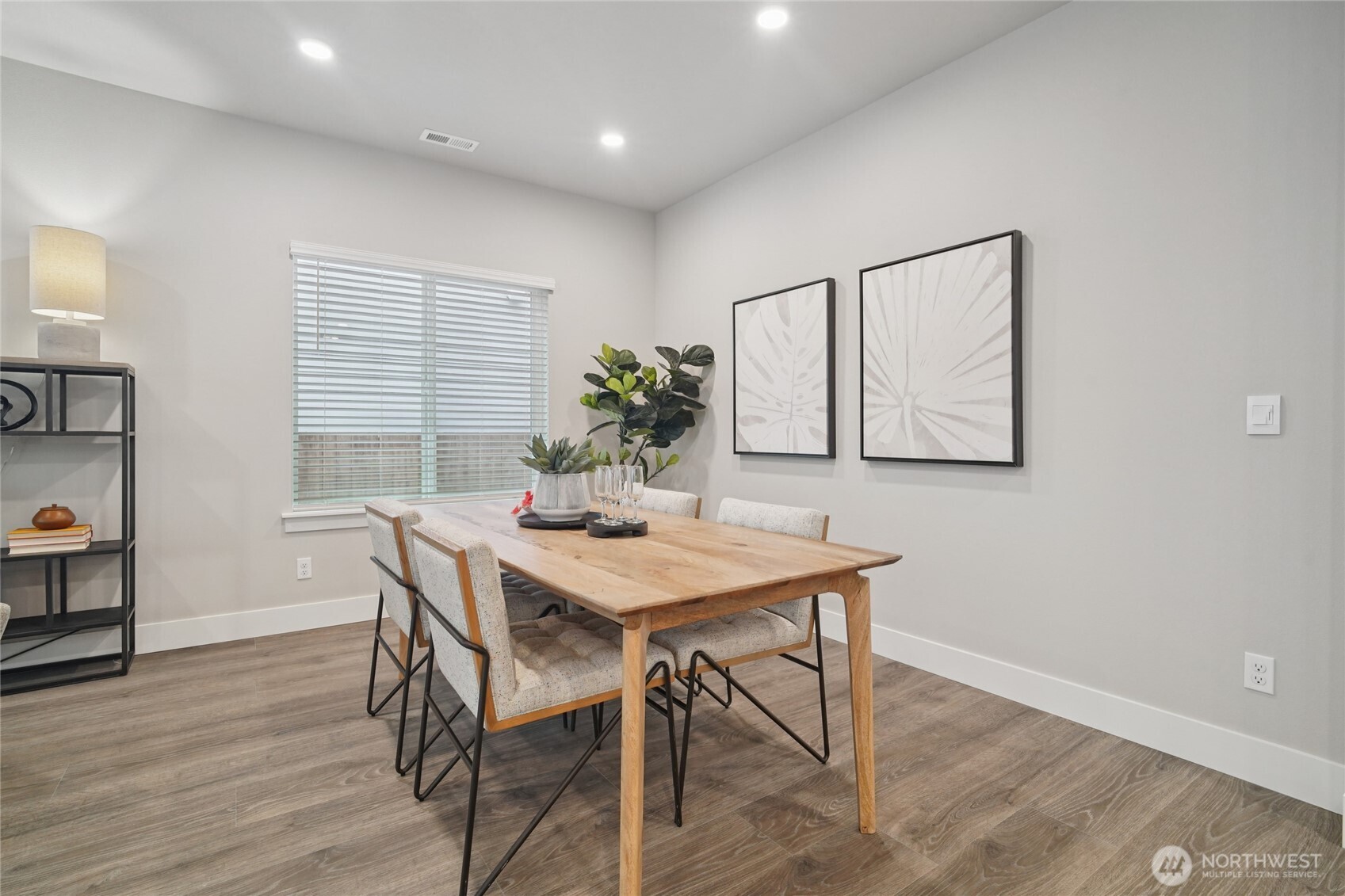 3822 194th Street Southeast Bothell, WA 98012 - Photo 8 of 29 a view of a dining room with furniture and wooden floor