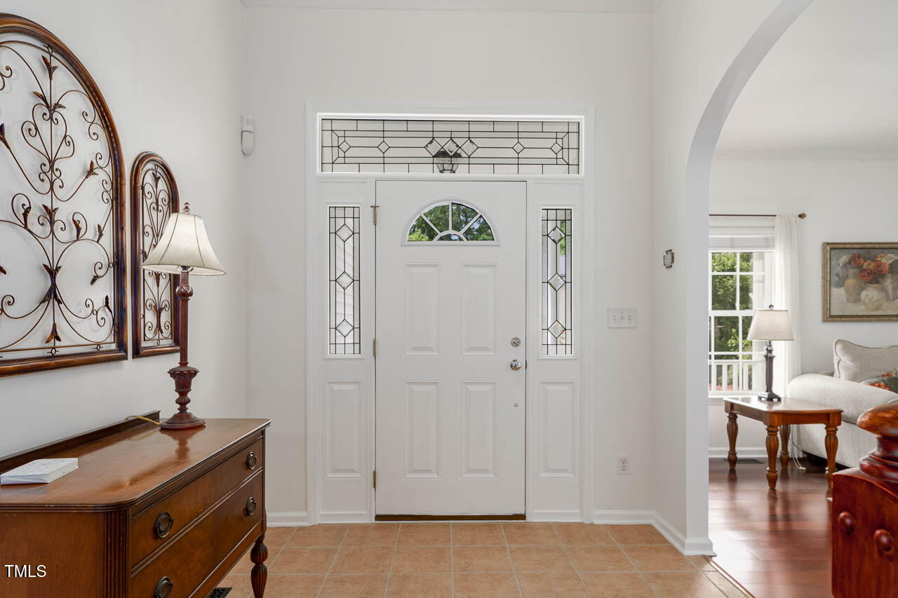 1059 Torrence Drive Apex, NC 27502 - Photo 2 of 49 a view of room with furniture and wooden floor