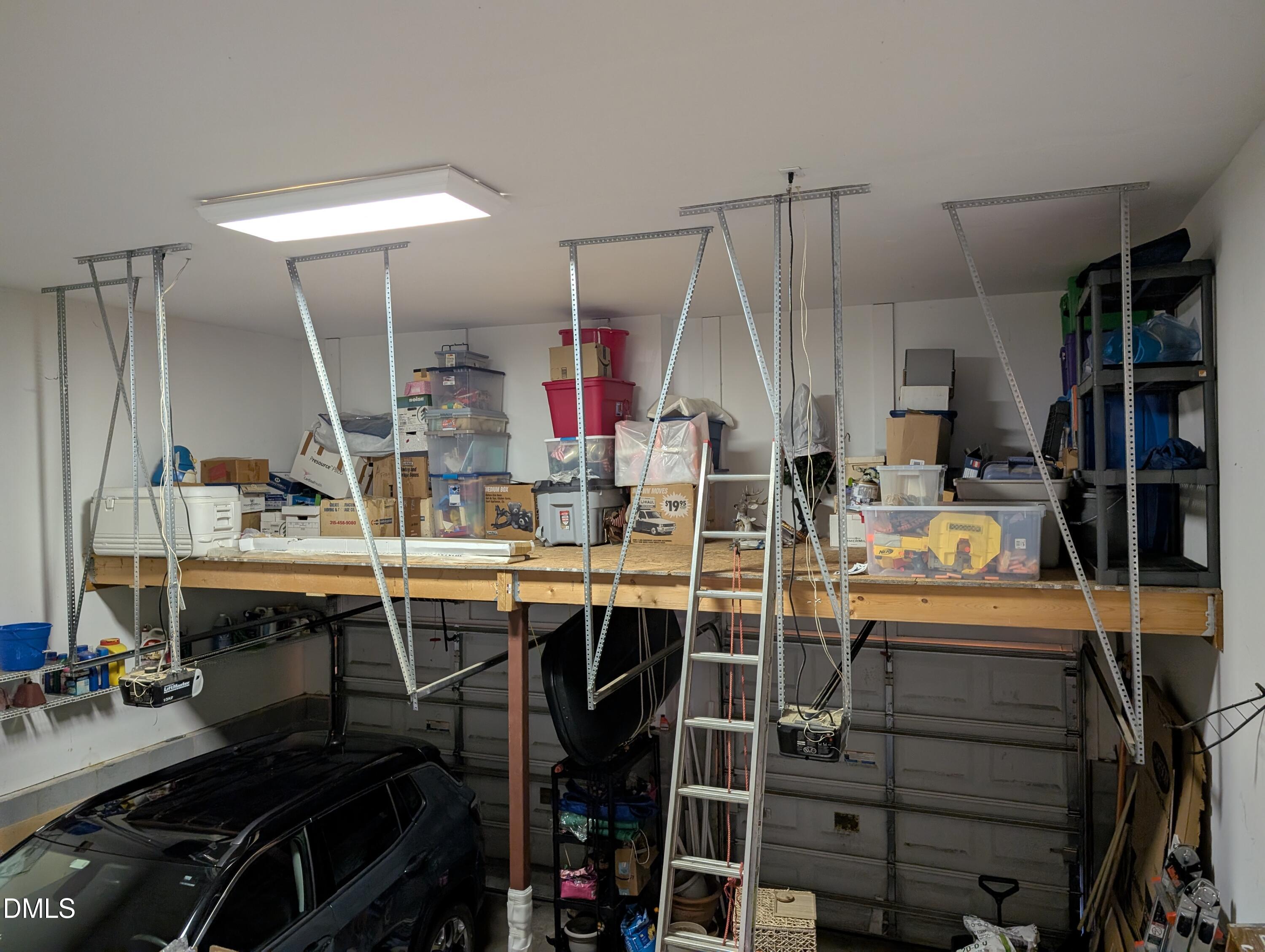 1059 Torrence Drive Apex, NC 27502 - Photo 42 of 49 1059 Torrence Dr Garage Storage