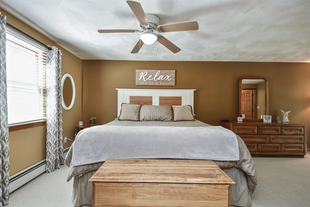 146 South Row Road Lunenburg, MA 01462 - Photo 21 of 32 a bedroom with a bed and dresser