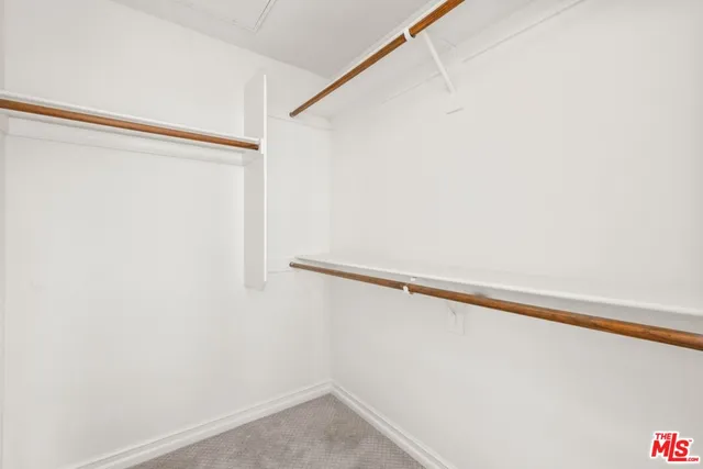 a view of small space with racks on the wall