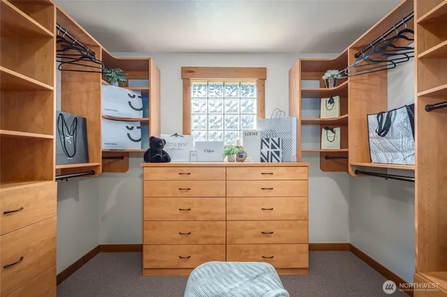 a view of walk in closet with window