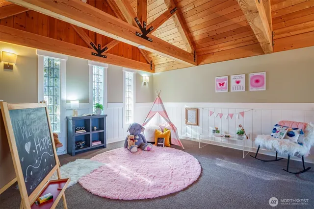 a view of sitting area with furniture and toys