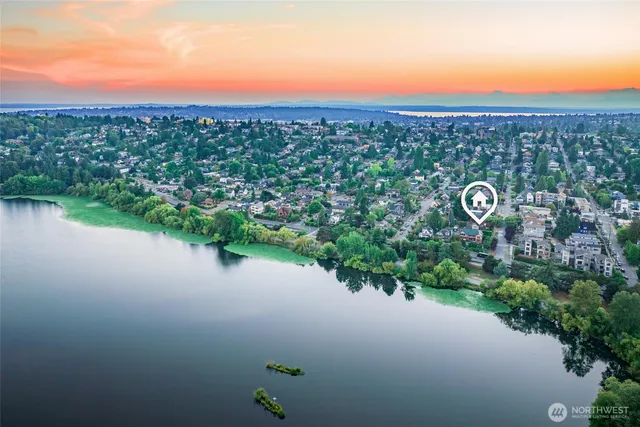 a view of a lake with a city