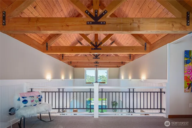 a view of a patio with a table and chairs