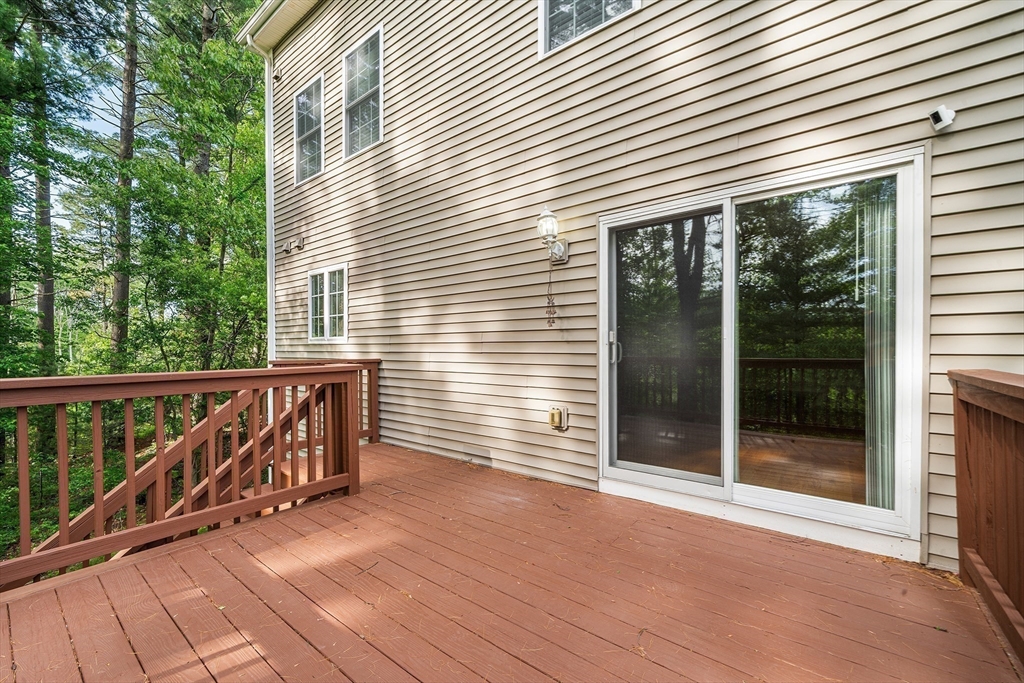 215 Rangeway Road, Unit 31 Billerica, MA 01862 - Photo 34 of 40 a view of outdoor space with deck