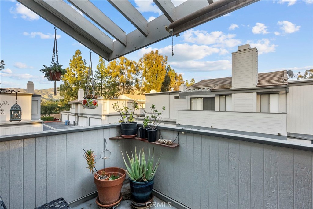 6490 Twin Cir Lane Simi Valley, CA 93063 - Photo 13 of 28 a house with river in front of it