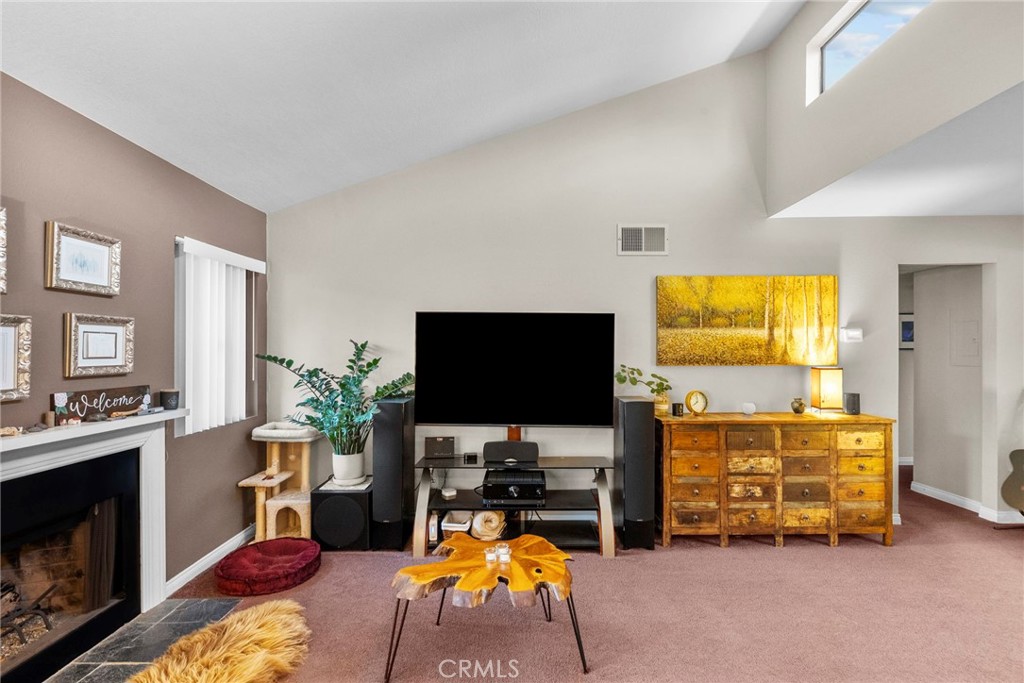 6490 Twin Cir Lane Simi Valley, CA 93063 - Photo 14 of 28 a living room with furniture and a flat screen tv