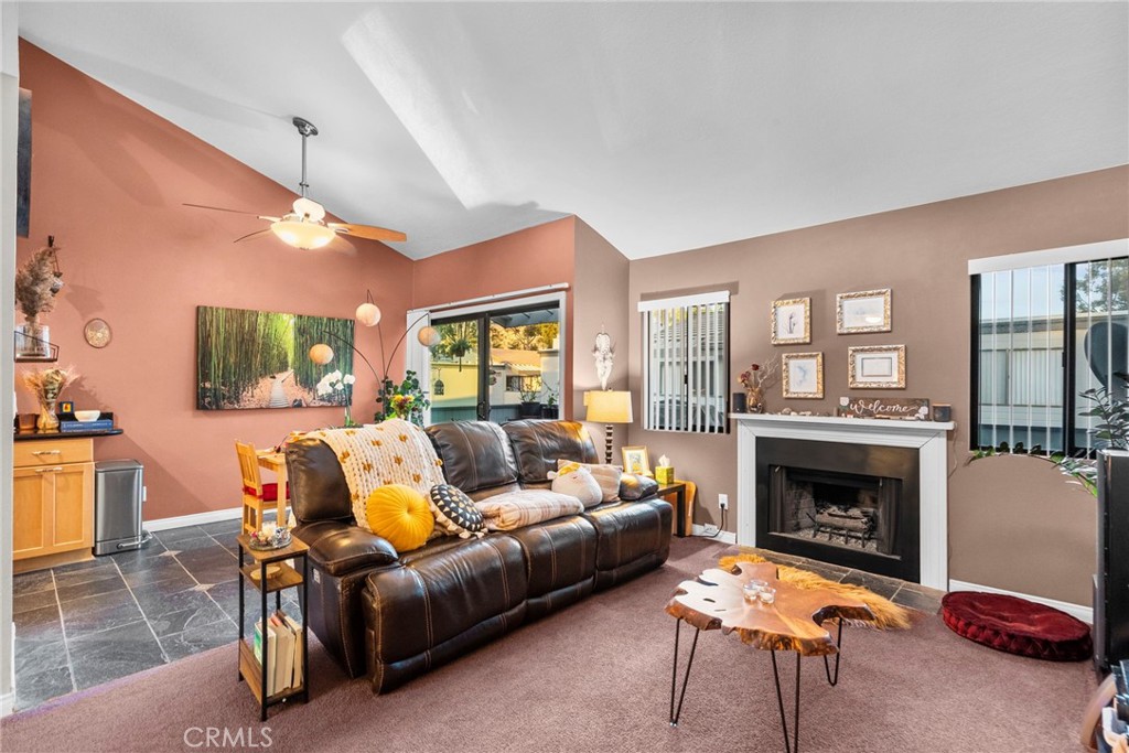 6490 Twin Cir Lane Simi Valley, CA 93063 - Photo 19 of 28 a living room with furniture and a fireplace