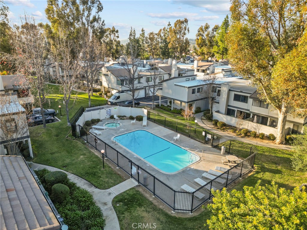6490 Twin Cir Lane Simi Valley, CA 93063 - Photo 2 of 28 an aerial view of a house with a swimming pool