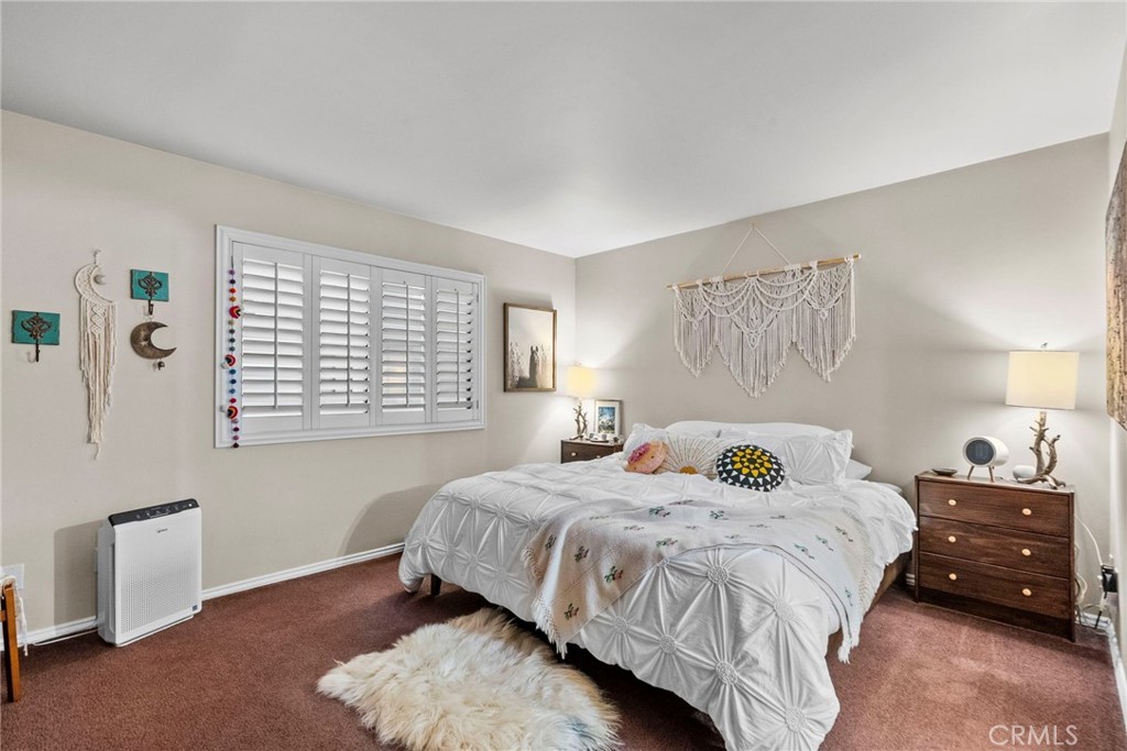 6490 Twin Cir Lane Simi Valley, CA 93063 - Photo 22 of 28 a bedroom with a bed and a window