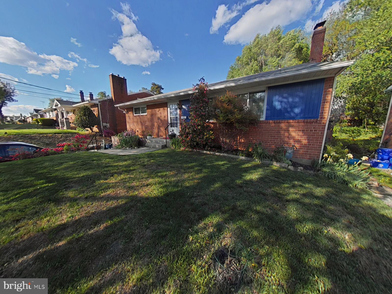 12807 Crisfield Road Silver Spring, MD 20906 - Photo 21 of 30 a view of a house with a yard
