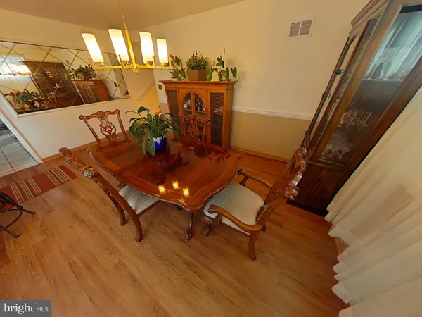 a room with furniture and wooden floor