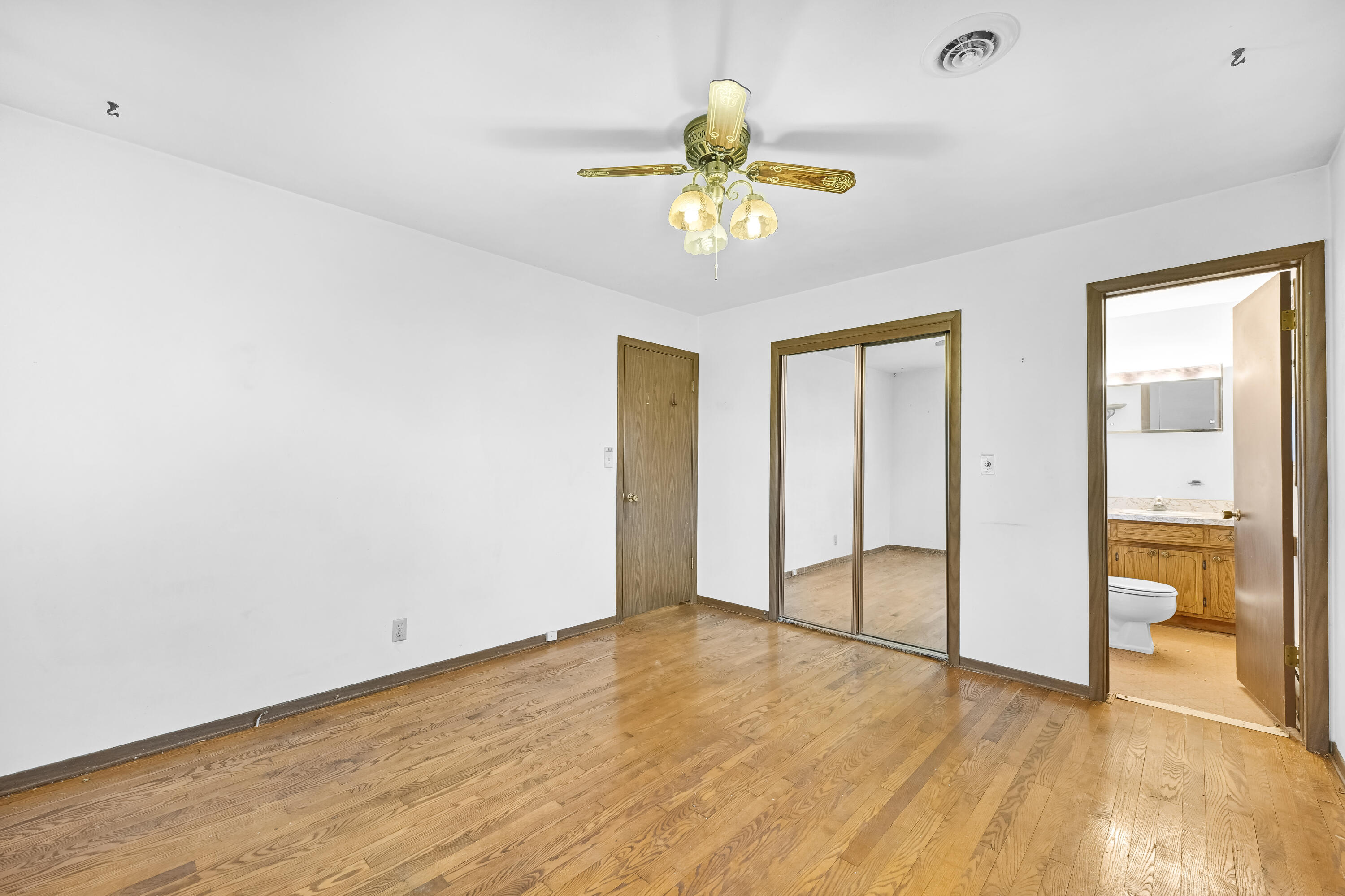 N5907 Aspen Drive Spring Prairie, WI 53105 - Photo 24 of 51 Primary Bedroom with Half Bath