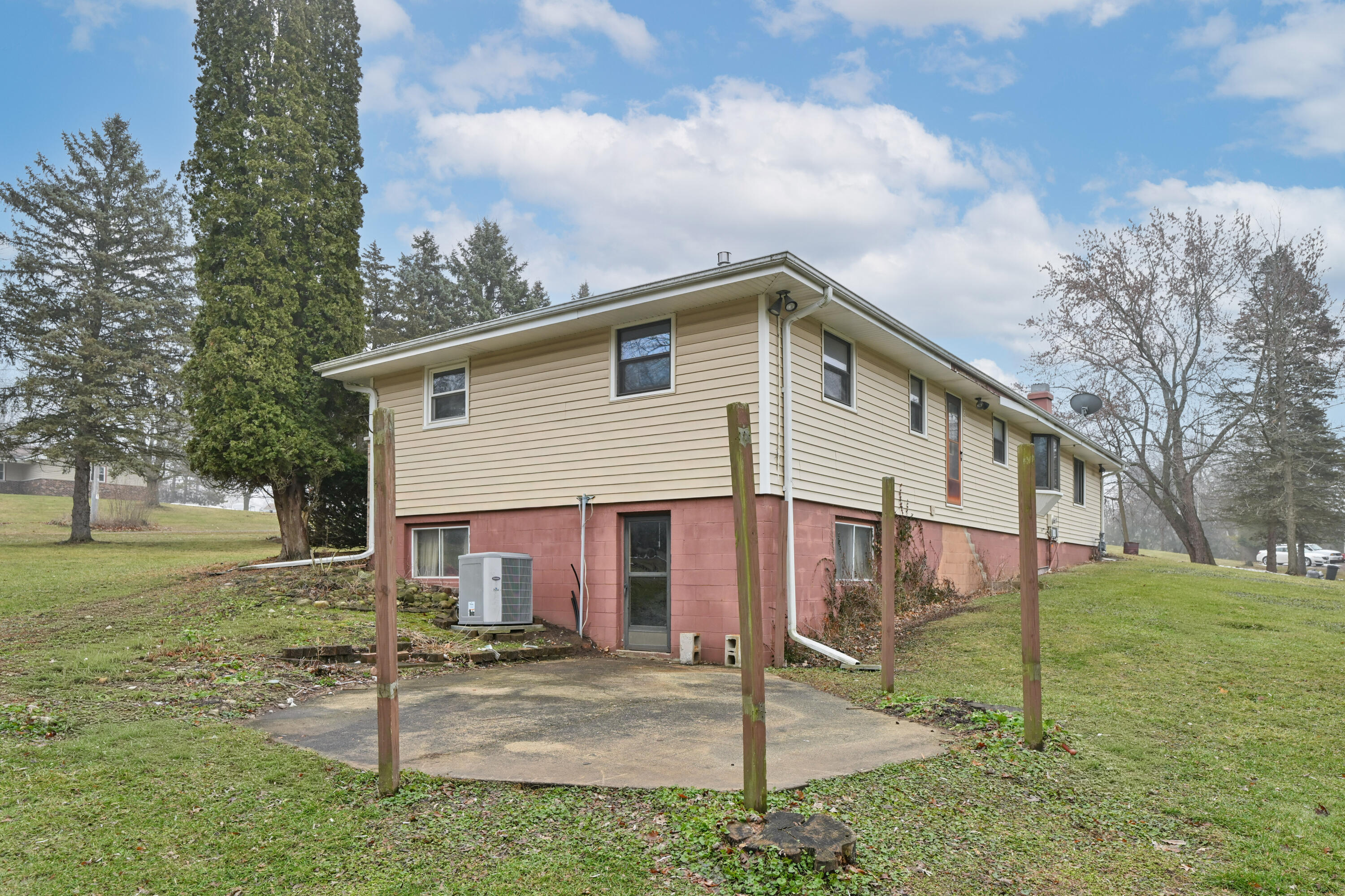 N5907 Aspen Drive Spring Prairie, WI 53105 - Photo 30 of 51 Side of House with Door in Lower Level